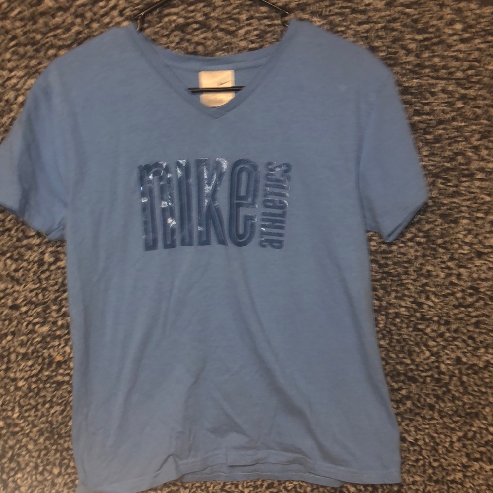 Blue Nike shirt